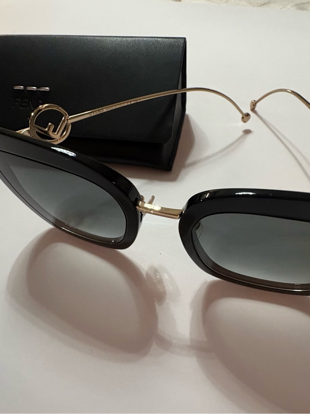Fendi Black and Gold Cat-Eye Sunglasses with Gray Gradient Lenses
